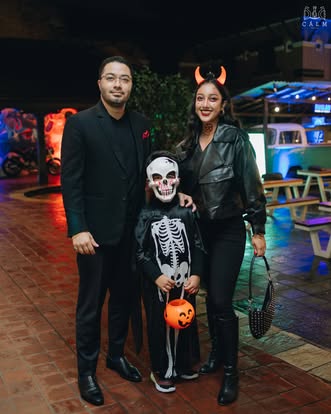 Family celebrating Halloween at Calm